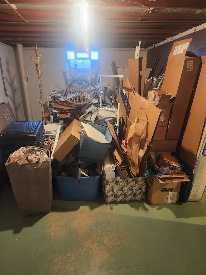 Roll-off dumpster container at job site for 15 Yard Dumpster Rental in Greenacres